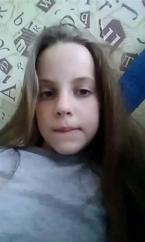 Cute kitty masturbates front the webcam .